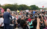 Matt Braynard, a former Trump campaign staffer who organized a rally near the US Capitol in Washington, addresses the participants, Saturday, Sept. 18, 2021. (AP Photo/Alex Brandon)