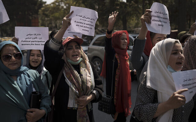 Women march to demand their rights under the Taliban rule during a demonstration near the former Women's Affairs Ministry building in Kabul, Afghanistan, September 19, 2021. (AP Photo) Women march to demand their rights under the Taliban rule during a demonstration near the former Women's Affairs Ministry building in Kabul, Afghanistan, September 19, 2021. (AP Photo)