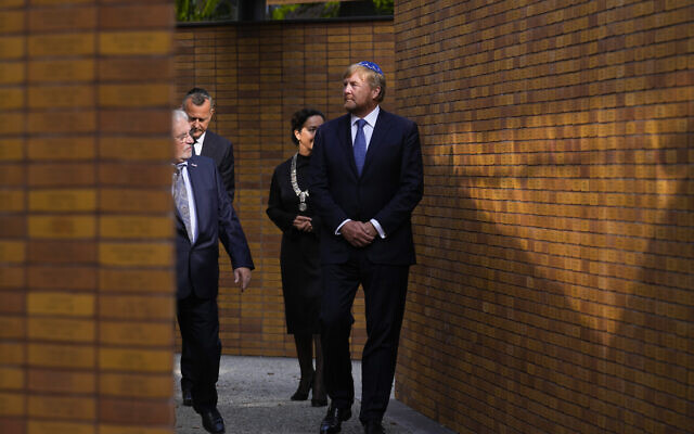 Holland's King Willem-Alexander, right, officially unveiling a new monument in the heart of Amsterdam's historic Jewish Quarter honoring the 102,000 Dutch victims of the Holocaust, September 19, 2021, (AP Photo/Peter Dejong) Holland's King Willem-Alexander, right, officially unveiling a new monument in the heart of Amsterdam's historic Jewish Quarter honoring the 102,000 Dutch victims of the Holocaust, September 19, 2021, (AP Photo/Peter Dejong)