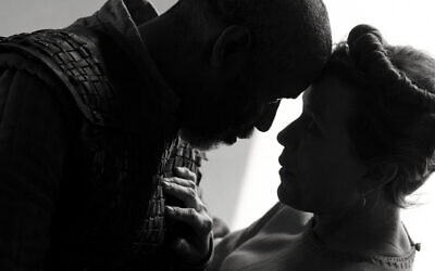 This image released by Apple shows Denzel Washington, left, and Frances McDormand in a scene from 'The Tragedy of Macbeth,' premiering at the New York Film Festival. (Alison Rosa/Apple via AP)