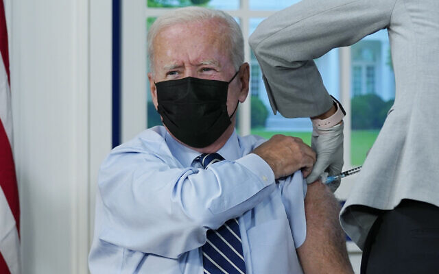 US President Joe Biden receives a COVID-19 booster shot during an event in the South Court Auditorium on the White House campus, Monday, Sept. 27, 2021, in Washington. (AP Photo/Evan Vucci) US President Joe Biden receives a COVID-19 booster shot during an event in the South Court Auditorium on the White House campus, Monday, Sept. 27, 2021, in Washington. (AP Photo/Evan Vucci)