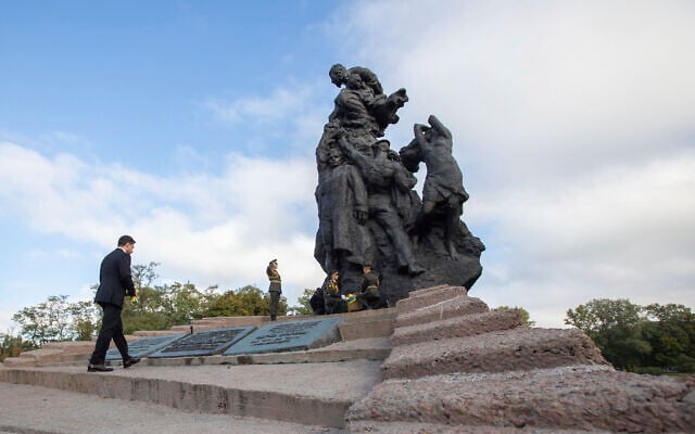 Ukrainian President Volodymyr Zelensky attends a ceremony at the monument to Jewish victims of Nazi massacres in Ukraine's capital Kyiv, on September 29, 2021. (Ukrainian Presidential Press Office via AP) Ukrainian President Volodymyr Zelensky attends a ceremony at the monument to Jewish victims of Nazi massacres in Ukraine's capital Kyiv, on September 29, 2021. (Ukrainian Presidential Press Office via AP)