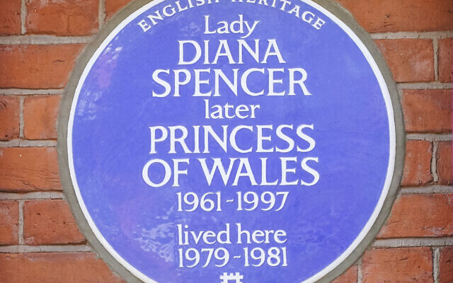 The English Heritage blue plaque is unveiled outside Coleherne Court, Old Brompton Road, London, September 29, 2021. (Dominic Lipinski/PA via AP)