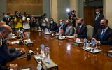 White House National Security Adviser Jake Sullivan, seated second right, meets with Egyptian Foreign Minister Sameh Shoukry and their delegations at the Foreign Ministry, in Cairo, Egypt, Wednesday, Sept. 29, 2021. (AP Photo/Nariman El-Mofty)