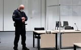 A judicial officer in the courtroom prior to the trial of Irmgard Furchner, a 96-year-old former secretary for the SS commander of the Stutthof concentration camp, in Itzehoe, Germany, September 30, 2021. (Markus Schreiber/AP)
