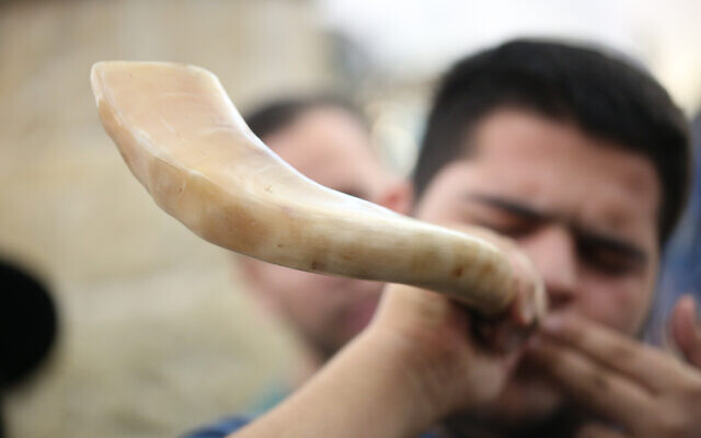 A Jewish man blows the shofar at the Rashbi gravesite in Meron, northern Israel, on September 9, 2017, prior to the Jewish holidays of Rosh Hashanah and Yom Kippur. (David Cohen/Flash90) A Jewish man blows the shofar at the Rashbi gravesite in Meron, northern Israel, on September 9, 2017, prior to the Jewish holidays of Rosh Hashanah and Yom Kippur. (David Cohen/Flash90)