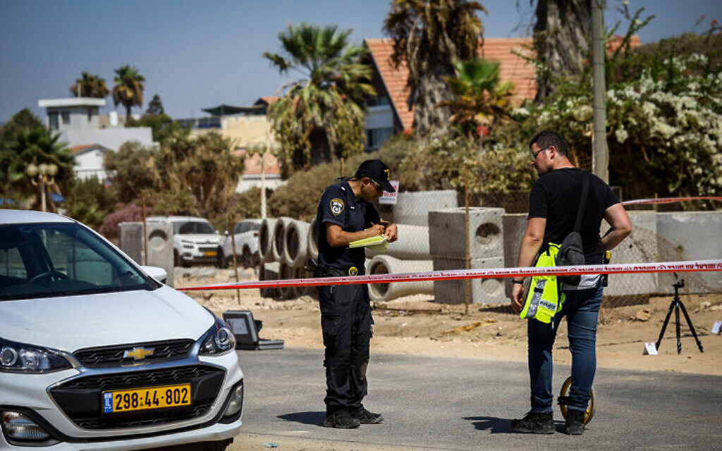 Police at the scene in Nahariya where a car ran over two policemen, killing one of them, September 21, 2021 (Alon Nadav/Flash90) Police at the scene in Nahariya where a car ran over two policemen, killing one of them, September 21, 2021 (Alon Nadav/Flash90)