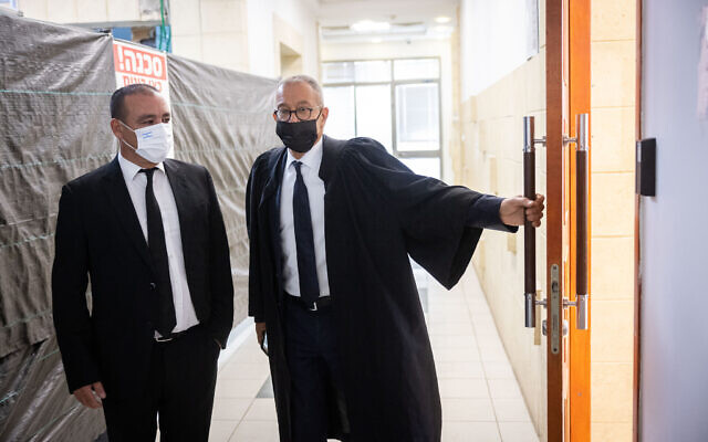 Former prime minister Benajmin Netanyahu's attorney Boaz Ben Tzur (R) and lawyer Jack Chen arrive at the Jerusalem District Court for a court hearing, September 29, 2021. (Yonatan Sindel/Flash90) Former prime minister Benajmin Netanyahu's attorney Boaz Ben Tzur (R) and lawyer Jack Chen arrive at the Jerusalem District Court for a court hearing, September 29, 2021. (Yonatan Sindel/Flash90)