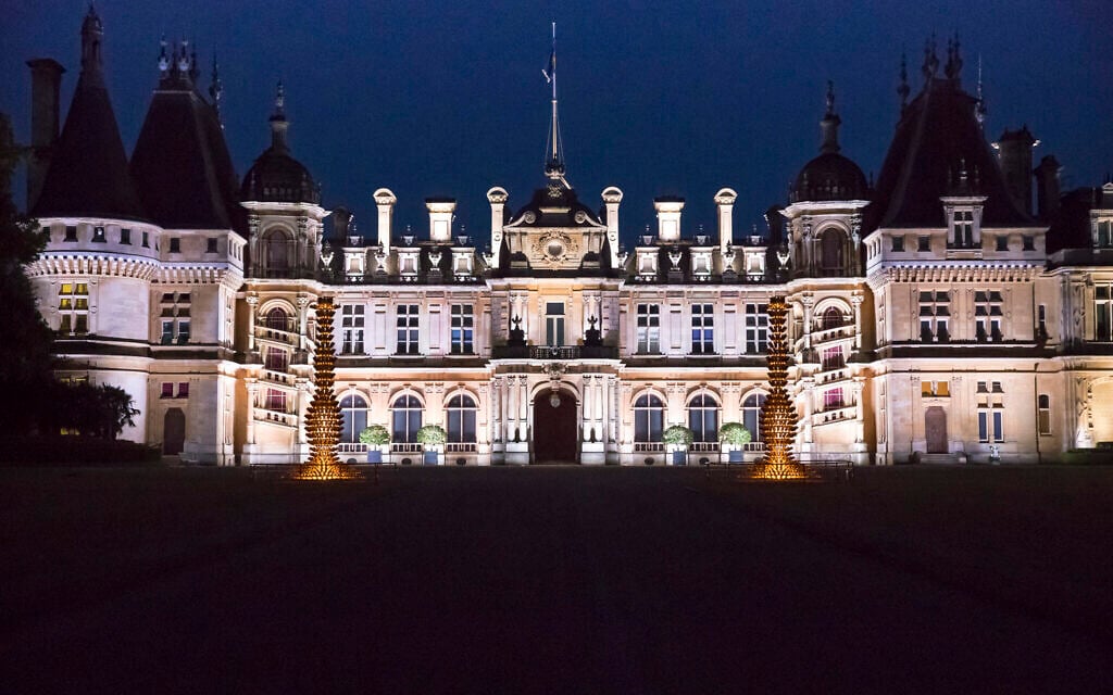 Exterior photo of Waddesdon Manor at dusk. (Waddesdon Image Library/ Chris Lacey)
