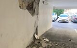 Cracks are seen in the side of an apartment building in Holon that was evacuated over fears it could collapse, September 11, 2021. (Fire and Rescue Services)