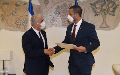 Foreign Minister Yair Lapid meets with Bahrain Ambassador to Israel Khaled Yousef al-Jalahmah in the Knesset on September 2, 2021. (Elad Gutman)