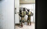 IDF soldiers search for weapons in the village of Burqin, near Jenin, on September 30, 2021. (Israel Defense Forces)