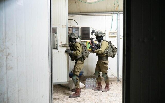 IDF soldiers search for weapons in the village of Burqin, near Jenin, on September 30, 2021. (Israel Defense Forces) IDF soldiers search for weapons in the village of Burqin, near Jenin, on September 30, 2021. (Israel Defense Forces)