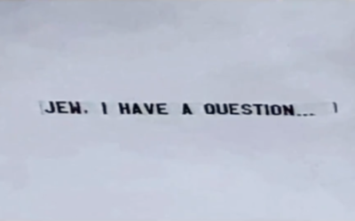 The banner in question flies across the Florida sky, August 2021. (Screenshot)