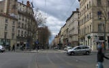 Pedestrians and cars cross Gebrial-Peri Square in Lyon, France, March 28, 2005. (Wikimedia Commons via JTA)