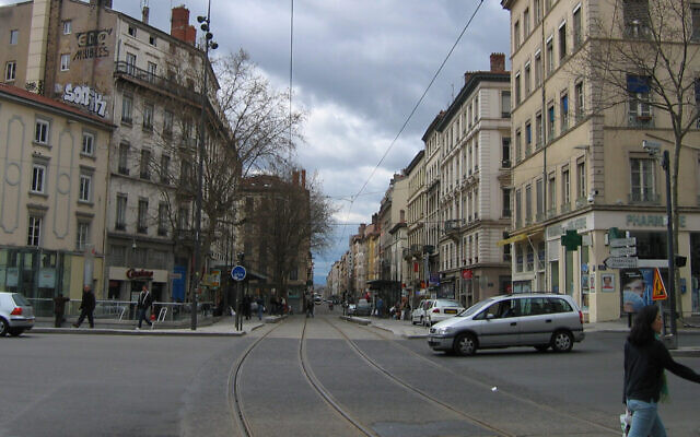 Pedestrians and cars cross Gebrial-Peri Square in Lyon, France, March 28, 2005. (Wikimedia Commons via JTA) Pedestrians and cars cross Gebrial-Peri Square in Lyon, France, March 28, 2005. (Wikimedia Commons via JTA)