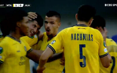 Maccabi Tel-Aviv players celebrate after Stipe Perica scores the first-ever goal of the UEFA Europa Conference League (Video screenshot)