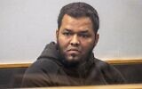 Ahmed Aathill Mohamed Samsudeen appears in the High Court in Auckland, New Zealand, August 7, 2018, after he was found possessing a series of images which depict extreme violence, cruelty, death and graphic war scenes. (Greg Bowker/New Zealand Herald via AP)