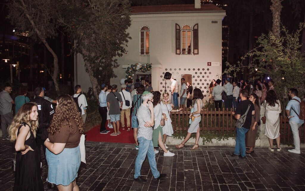 Guests gather at the red carpet cocktail hour for the grand opening of the Jewish Point congregation's new synagogue building in Tel Aviv, August 26, 2021. (Courtesy)