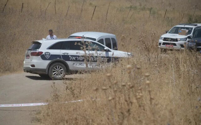 Police forces at the scene of the alleged murder of a 46-year-old woman from Nof Hagalil, near the Yarden Haharari section of the Jordan River, on August 7, 2021. (Israel Police) Police forces at the scene of the alleged murder of a 46-year-old woman from Nof Hagalil, near the Yarden Haharari section of the Jordan River, on August 7, 2021. (Israel Police)