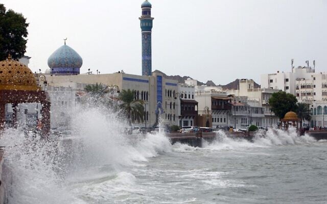 High waves break on the sea side promenade in the Omani capital Muscat on October 2, 2021, as the Shaheen tropical storm hits the country. (MOHAMMED MAHJOUB / AFP) High waves break on the sea side promenade in the Omani capital Muscat on October 2, 2021, as the Shaheen tropical storm hits the country. (MOHAMMED MAHJOUB / AFP)