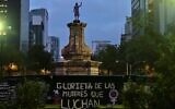 View of a statue in honor of "Women who fight" placed by feminist collectives at the roundabout of Paseo de la Reforma Avenue, from where the effigy of Christopher Columbus had been removed, in Mexico City, on October 7, 2021. (PEDRO PARDO / AFP)