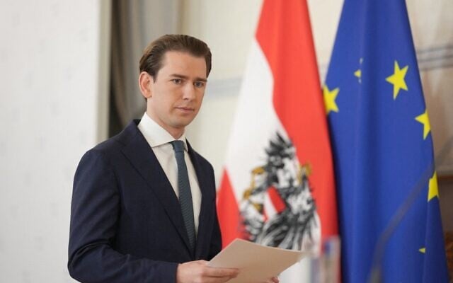 Austrian Chancellor Sebastian Kurz arrives to give a press statement on the government crisis at the Federal Chancellery in Vienna, Austria, on October 9, 2021. (Georg Hochmuth/APA/AFP) Austrian Chancellor Sebastian Kurz arrives to give a press statement on the government crisis at the Federal Chancellery in Vienna, Austria, on October 9, 2021. (Georg Hochmuth/APA/AFP)