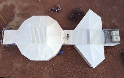 This picture taken on October 10, 2021 shows an aerial view of a habitat where astronauts from a team from Europe and Israel will participate in a training mission for planet Mars at a site that simulates an off-site station at the Ramon Crater in Mitzpe Ramon in Israel's southern Negev desert.  (Photo by JACK GUEZ / AFP)