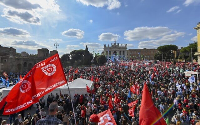 An anti-fascist rally called by Italian Labour unions CGIL, CISL and UIL at Piazza San Giovanni in Rome, on October 16, 2021, a week after a demonstration against the so-called Green Pass degenerated into an assault on the CGIL trade union building, led by the neo-fascist Forza Nuova party. (Alberto Pizzoli/AFP)