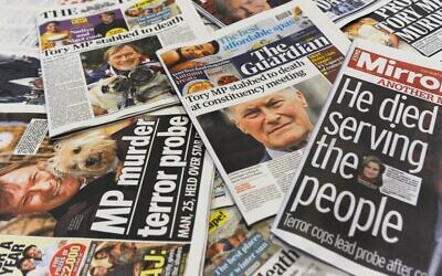 An arrangement of UK daily newspapers photographed in London on October 16, 2021 shows front page headlines reporting on the fatal stabbing of British lawmaker David Amess. (DANIEL SORABJI / AFP) An arrangement of UK daily newspapers photographed in London on October 16, 2021 shows front page headlines reporting on the fatal stabbing of British lawmaker David Amess. (DANIEL SORABJI / AFP)