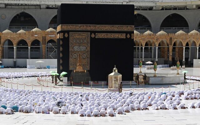 The Grand Mosque in the holy Saudi city of Mecca operates at full capacity on October 17, 2021, with worshippers praying shoulder-to-shoulder for the first time since the coronavirus pandemic began. (AFP)