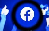 Illustrative: The US online social media and social networking service Facebook's logo on a tablet screen in Moscow, on October 18, 2021. (Kirill Kudryavtsev/AFP)