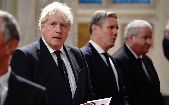 Britain's Prime Minister Boris Johnson (L), Britain's main opposition Labour Party leader Keir Starmer (C) and Scottish National Party (SNP) Westminster leader Ian Blackford attend a service of prayer and remembrance in honor of slain British lawmaker David Amess, at St Margaret's Church in London, October 18, 2021. (Jonathan Brady/ Pool/ AFP) Britain's Prime Minister Boris Johnson (L), Britain's main opposition Labour Party leader Keir Starmer (C) and Scottish National Party (SNP) Westminster leader Ian Blackford attend a service of prayer and remembrance in honor of slain British lawmaker David Amess, at St Margaret's Church in London, October 18, 2021. (Jonathan Brady/ Pool/ AFP)