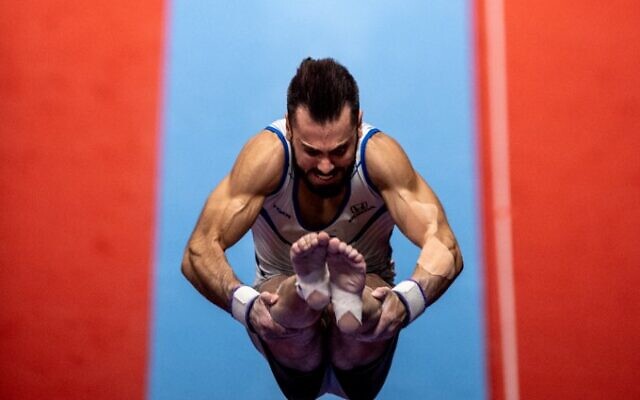 Israel's Andrey Medvedev competes in the vault event at the men's apparatus finals during the Artistic Gymnastics World Championships at the Kitakyushu City Gymnasium in Kitakyushu, Fukuoka prefecture, on October 24, 2021. (Philip Fong/AFP)