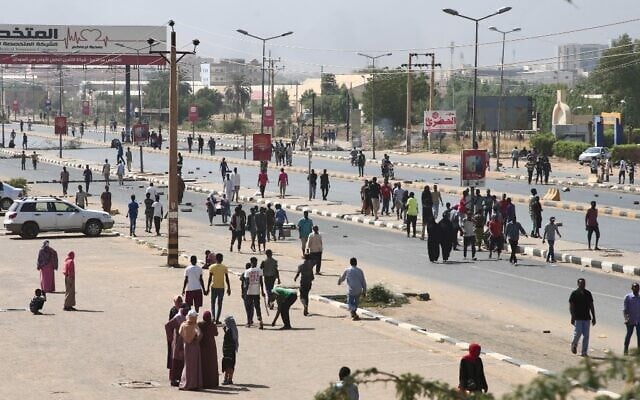 Sudanese demonstrators rally in the capital Khartoum, on October 25, 2021 (Photo by AFP)