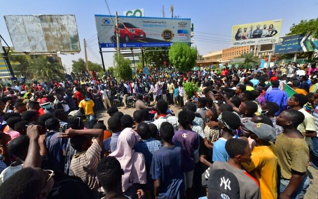 Sudanese people protest against a military coup overthrowing the transition to civilian rule, on October 25, 2021, in the capital Khartoum's twin city of Omdurman. (AFP) Sudanese people protest against a military coup overthrowing the transition to civilian rule, on October 25, 2021, in the capital Khartoum's twin city of Omdurman. (AFP)