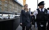 Facebook whistleblower Frances Haugen (L) leaves the Houses of Parliament in central London on October 25, 2021 after giving evidence to members of the UK parliament on the Joint Committee on the draft Online Safety Bill. - Facebook whistleblower Frances Haugen told UK lawmakers Monday that posting content featuring anger and hate "is the easiest way to grow" on the social media platform as she urged better regulation. The ex-Facebook employee, who earlier this year shared a trove of internal documents alleging it knew its products were fueling hate and harming children's mental health,  argued the platform was "unquestionably" fuelling hate. (Photo by Tolga Akmen / AFP)