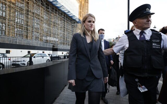 Facebook whistleblower Frances Haugen (L) leaves the Houses of Parliament in central London on October 25, 2021 after giving evidence to members of the UK parliament on the Joint Committee on the draft Online Safety Bill. - Facebook whistleblower Frances Haugen told UK lawmakers Monday that posting content featuring anger and hate "is the easiest way to grow" on the social media platform as she urged better regulation. The ex-Facebook employee, who earlier this year shared a trove of internal documents alleging it knew its products were fueling hate and harming children's mental health, argued the platform was "unquestionably" fuelling hate. (Photo by Tolga Akmen / AFP) Facebook whistleblower Frances Haugen (L) leaves the Houses of Parliament in central London on October 25, 2021 after giving evidence to members of the UK parliament on the Joint Committee on the draft Online Safety Bill. - Facebook whistleblower Frances Haugen told UK lawmakers Monday that posting content featuring anger and hate "is the easiest way to grow" on the social media platform as she urged better regulation. The ex-Facebook employee, who earlier this year shared a trove of internal documents alleging it knew its products were fueling hate and harming children's mental health, argued the platform was "unquestionably" fuelling hate. (Photo by Tolga Akmen / AFP)