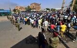Sudanese security forces keep watch as they protect a military hospital and government offices during protests against a military coup that overthrew the transition to civilian rule, in the capital Khartoum's twin city of Omdurman, on October 25, 2021. (AFP)