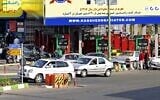Cars and motorbikes line up to fill up at a service station in Iran's capital Tehran, on October 26, 2021, amid a nationwide disruption of the gas distribution system. (Atta Kenare/AFP)