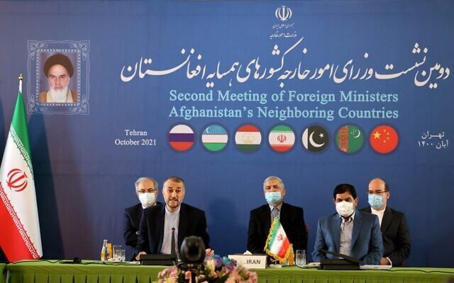 Iran's Foreign Minister Hossein Amir-Abdoulahian (2nd-L) and First Vice-President Mohammad Mokhber (2nd-R) speak during the multilateral conference on Afghanistan, in the Iranian capital Tehran on October 27, 2021. (ATTA KENARE / AFP) Iran's Foreign Minister Hossein Amir-Abdoulahian (2nd-L) and First Vice-President Mohammad Mokhber (2nd-R) speak during the multilateral conference on Afghanistan, in the Iranian capital Tehran on October 27, 2021. (ATTA KENARE / AFP)