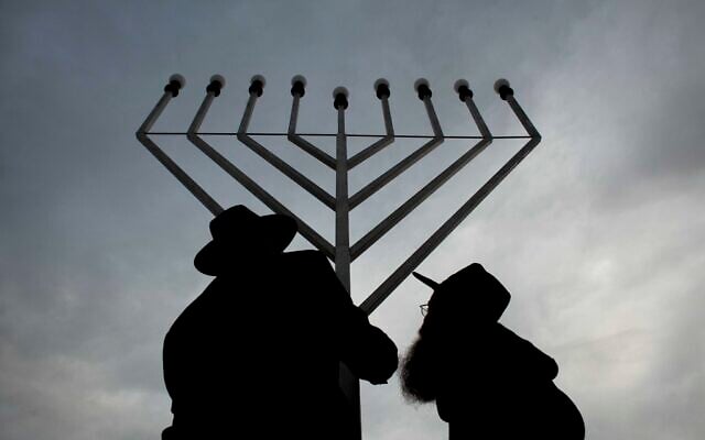 Illustrative: A giant Lubavitch Hanukkah Menorah is set up in central Berlin, Tuesday, December 20, 2011. (AP Photo/Markus Schreiber) Illustrative: A giant Lubavitch Hanukkah Menorah is set up in central Berlin, Tuesday, December 20, 2011. (AP Photo/Markus Schreiber)