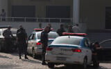 Illustrative: Police officers stand at the civil police headquarter in Rio de Janeiro, Brazil, June 29, 2017.  (Leo Correa/AP)