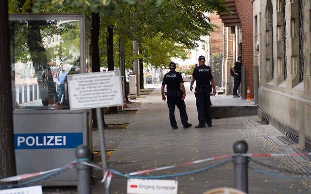 Illustrative: German police patrol in front of the 'New Synagogue' at Oranienburger Strasse in Berlin, Germany, September 24, 2020. (AP Photo/Markus Schreiber) Illustrative: German police patrol in front of the 'New Synagogue' at Oranienburger Strasse in Berlin, Germany, September 24, 2020. (AP Photo/Markus Schreiber)