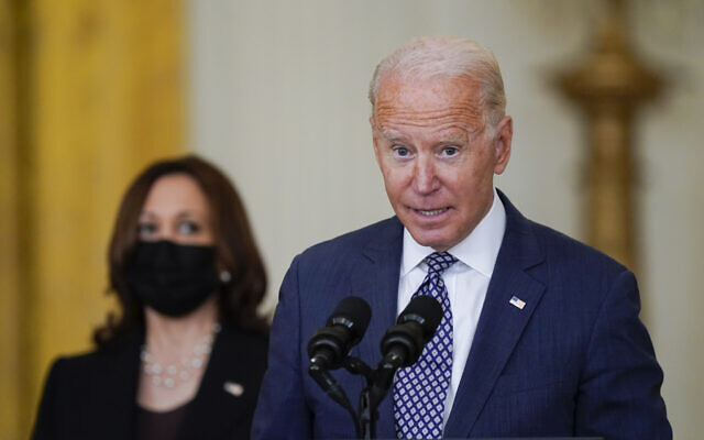 US President Joe Biden speaks about the evacuation of American citizens, their families, SIV applicants and vulnerable Afghans in the East Room of the White House on Aug. 20, 2021, in Washington. US Vice President Kamala Harris listens at left. (AP Photo/Manuel Balce Ceneta) US President Joe Biden speaks about the evacuation of American citizens, their families, SIV applicants and vulnerable Afghans in the East Room of the White House on Aug. 20, 2021, in Washington. US Vice President Kamala Harris listens at left. (AP Photo/Manuel Balce Ceneta)