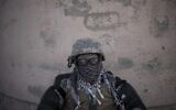 A Taliban fighter guards the entrance of the Pul-e-Charkhi prison in Kabul, Afghanistan, Monday, Sept. 13, 2021 (AP Photo/Felipe Dana)