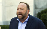 Infowars host and conspiracy theorist Alex Jones speaks outside of the Dirksen building on Capitol Hill in Washington,  September 5, 2018. (Jose Luis Magana/AP)