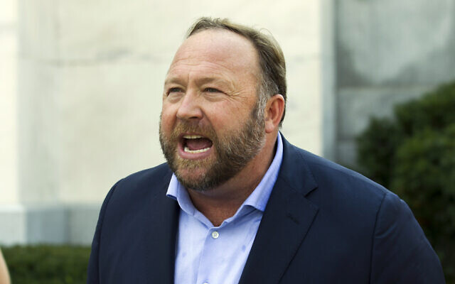 Infowars host and conspiracy theorist Alex Jones speaks outside of the Dirksen building on Capitol Hill in Washington, September 5, 2018. (Jose Luis Magana/AP) Infowars host and conspiracy theorist Alex Jones speaks outside of the Dirksen building on Capitol Hill in Washington, September 5, 2018. (Jose Luis Magana/AP)