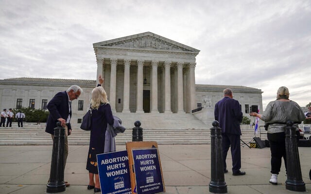 The Supreme Court is seen on the first day of the new term as activists opposed to abortion demonstrate on the plaza, in Washington, Monday, Oct. 4, 2021. (J. Scott Applewhite/AP Photo)
