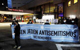 People gather in front of the Westin Hotel in Leipzig, Germany, on October 5, 2021, to show solidarity with the musician Gil Ofarim. (Dirk Knofe/dpa via AP)